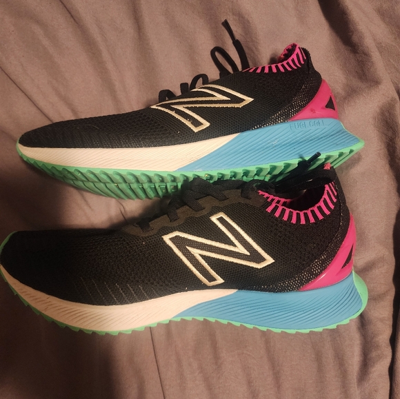 Like new athletic shoes. - Picture 2 of 4